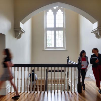 People walking through building. 