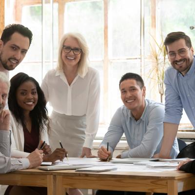 Group of diverse people working around a table